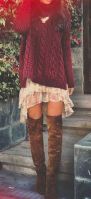Shortish dress, tall boots sweater over the top.